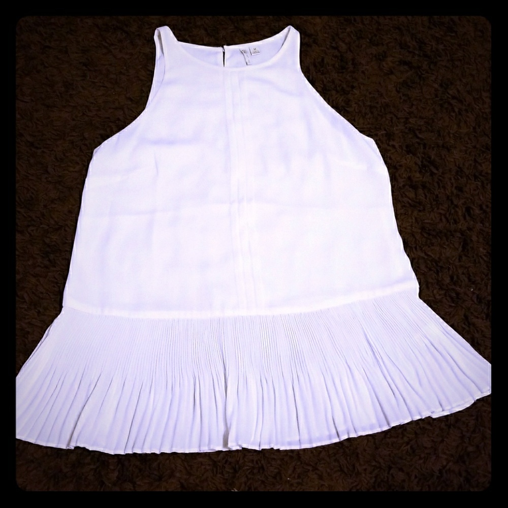 White peplum pleated hem sleeveless top